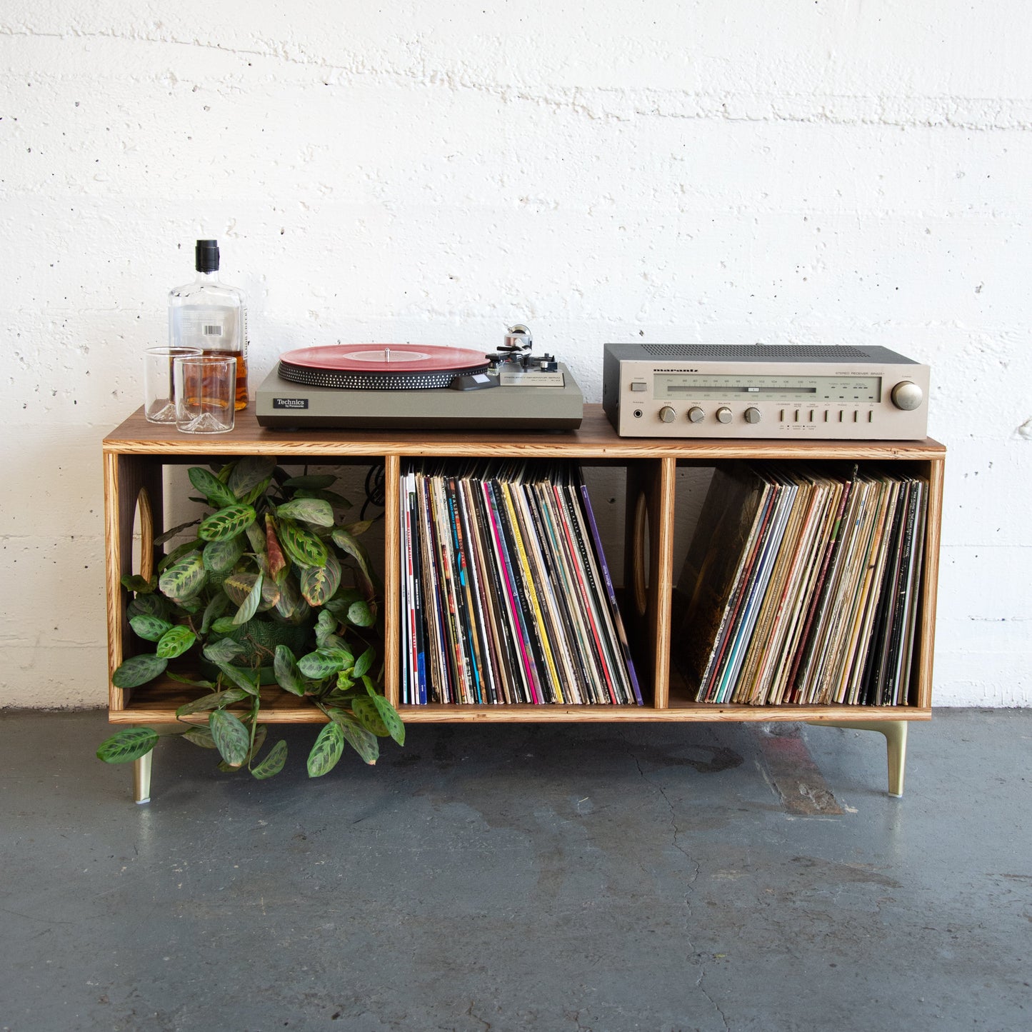 Wooden walnut vinyl record cabinet and turntable. 