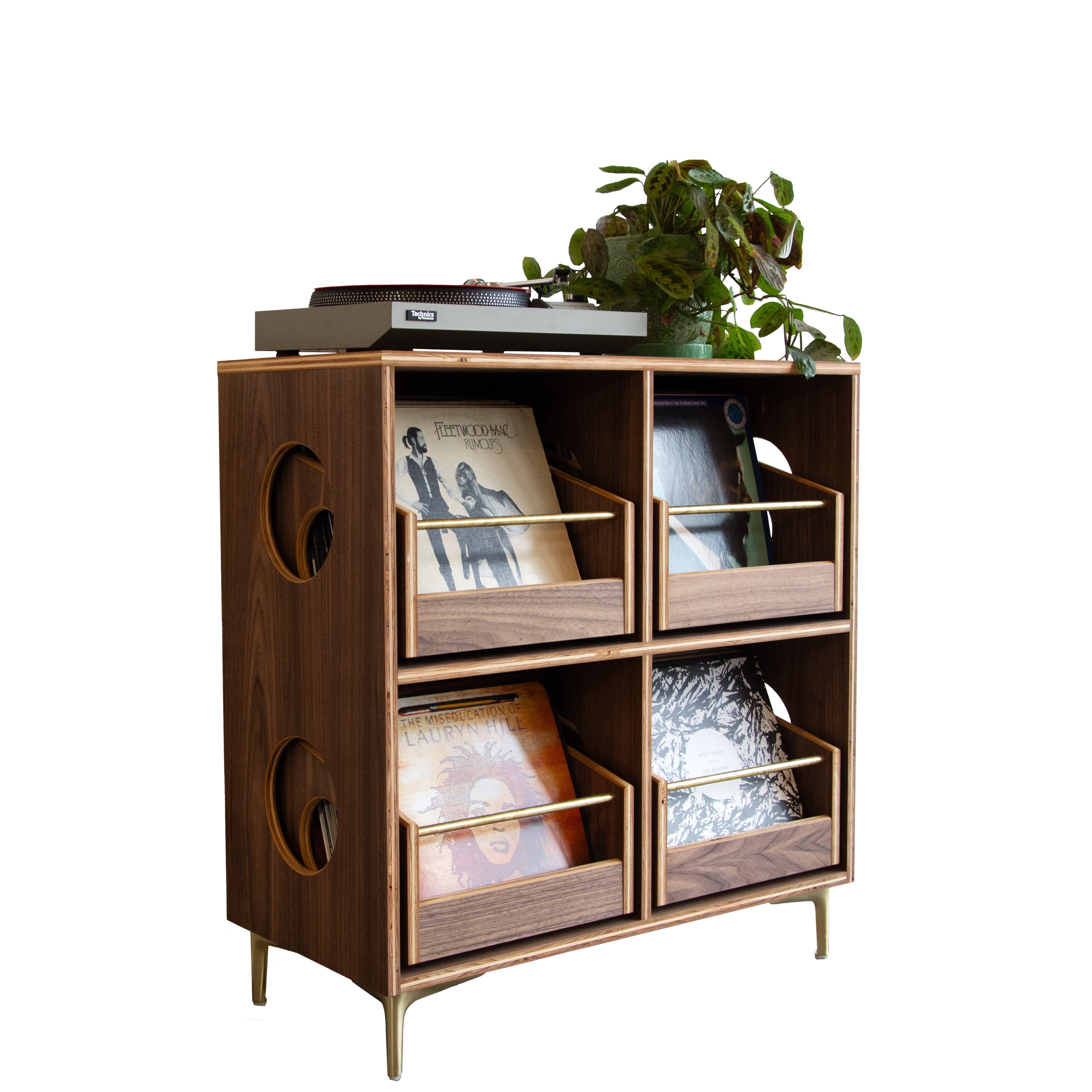 Wooden record cabinet with decorative items on a white background