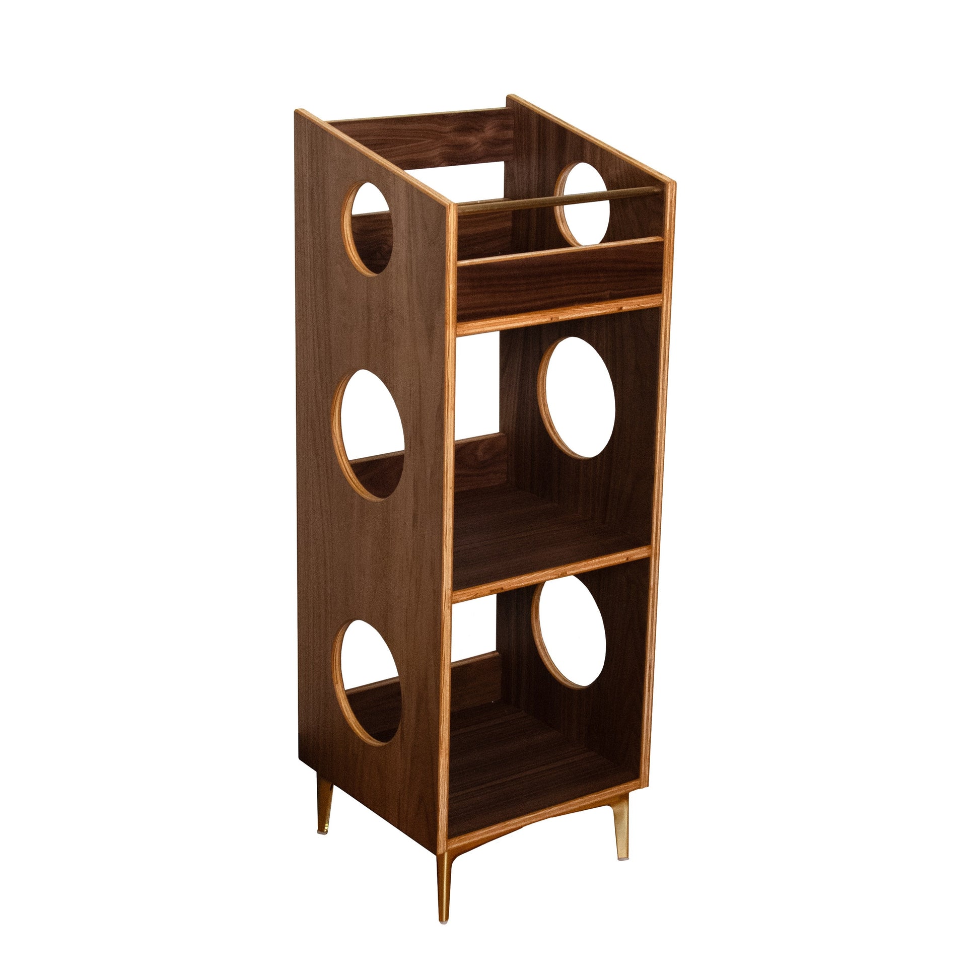 A mid-century modern wooden shelf unit with three tiers, featuring circular cutouts on the side panels and tapered legs, shown on a plain white background.