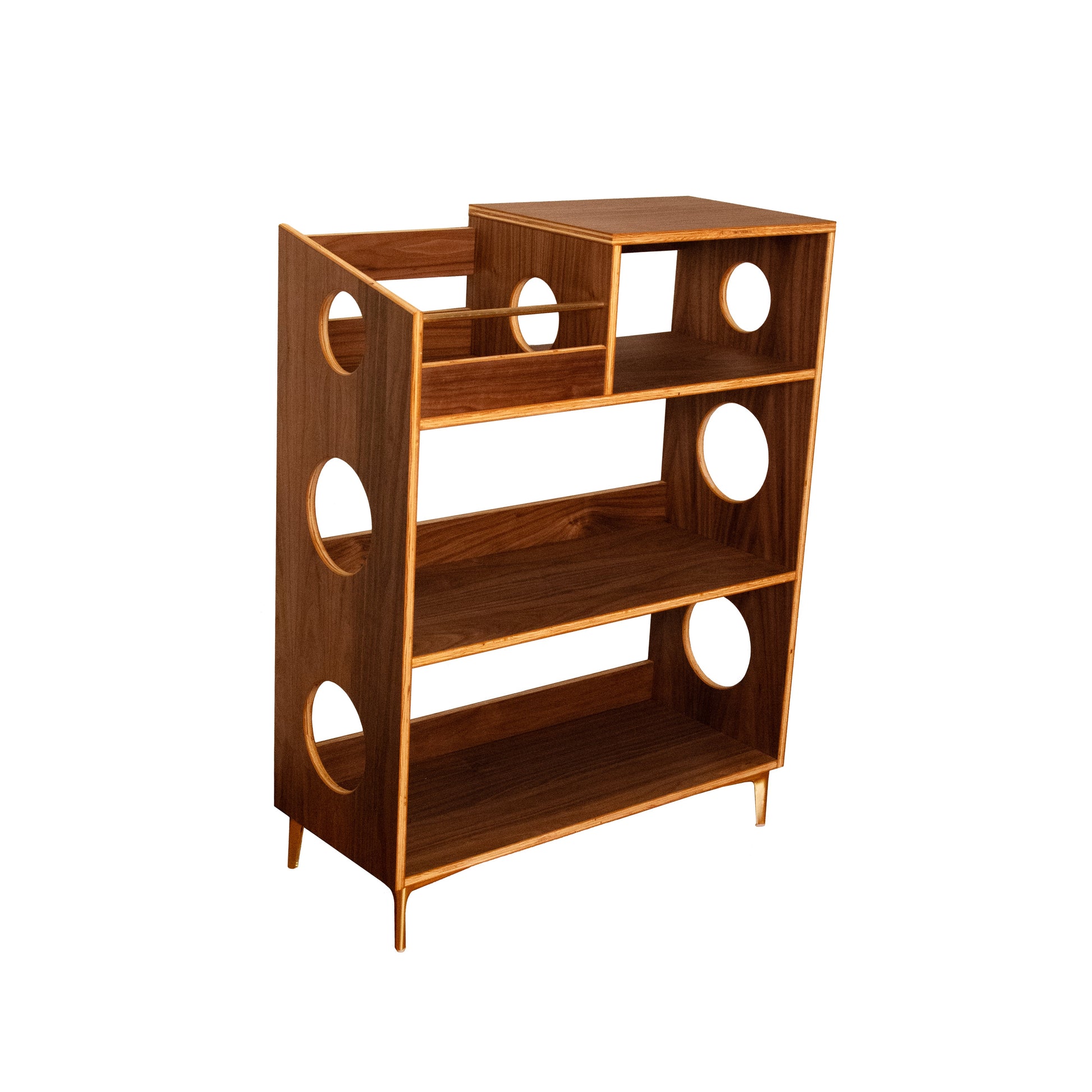 A mid-century modern wooden bookcase with a warm brown wood finish, featuring circular cutouts on the side panels and open shelving, shown on a plain white background.